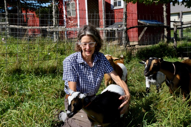 Ms. Murphy with her with goats