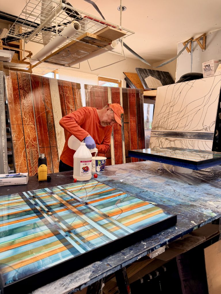 Michael Kessler demonstrates a resin pour at his Santa Fe studio